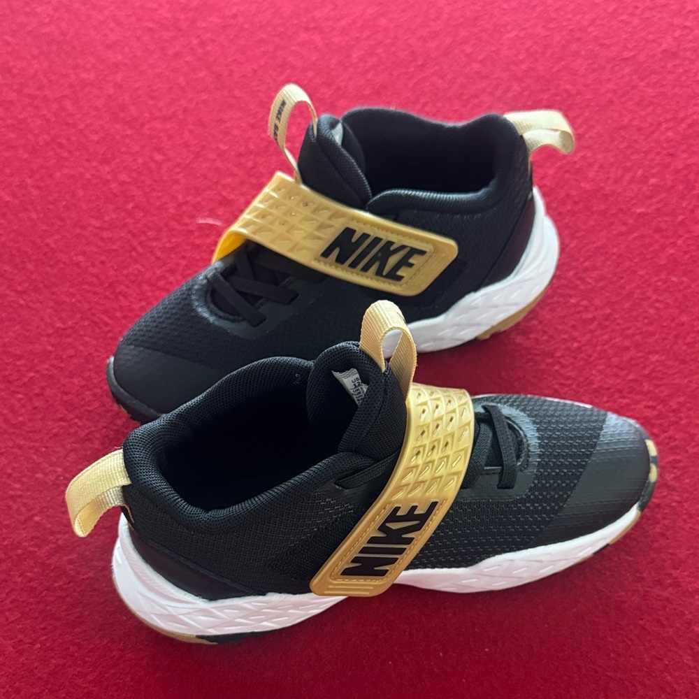 Nike Kids Black and Gold Sneakers